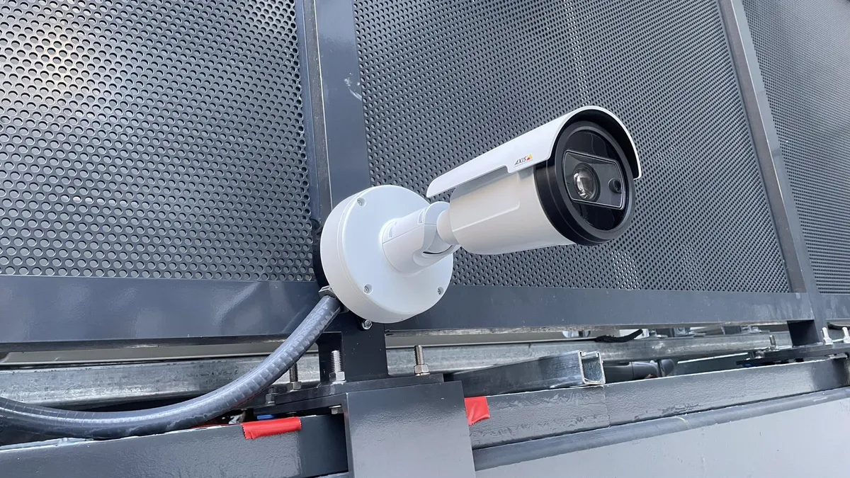Bullet security camera installed on a commercial building exterior