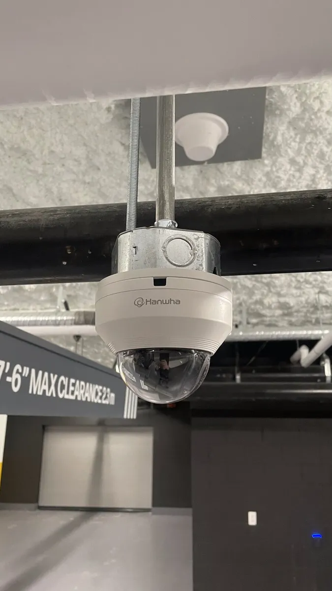 Dome camera installed in an underground parkade