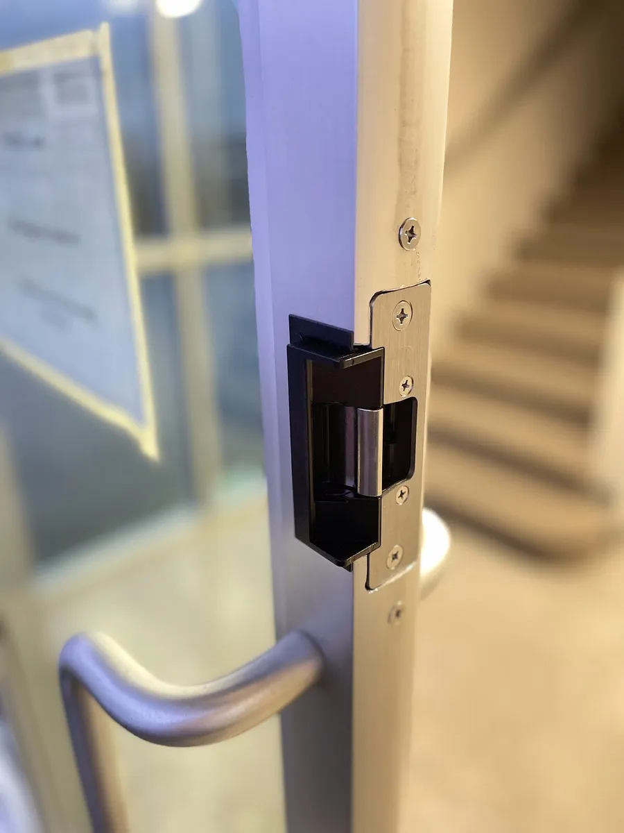 Electric strike on a stairwell entrance door
