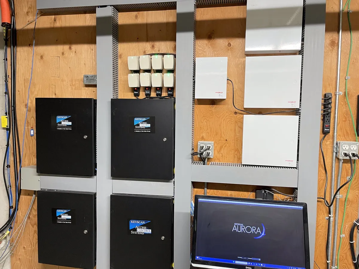 Access control panels with a system monitoring workstation
